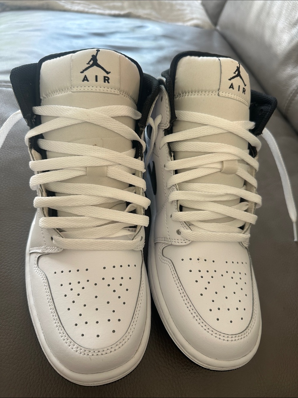 Jordan Black and White High-Top Sneakers